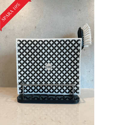 Premium disktrasor i hållare på marmorbänkskiva - elegant köksdesign med grått klinker och diskborste